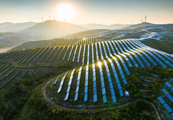 Aerial View Of Solar Panels In Mountain